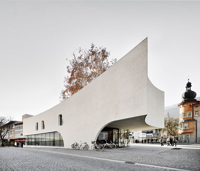 curving concrete wraps modus architects' 'treehugger' tourist office in italy designboom