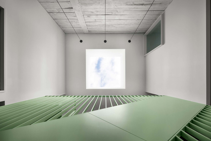 sage green staircase takes center stage in montreal residence renovation by naturehumaine