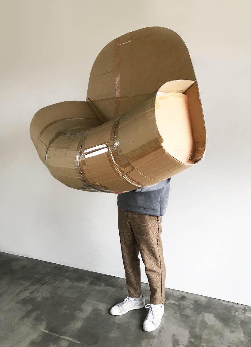 jin kuramoto's 'maki' chair for OFFECCT features a curved hollow backrest