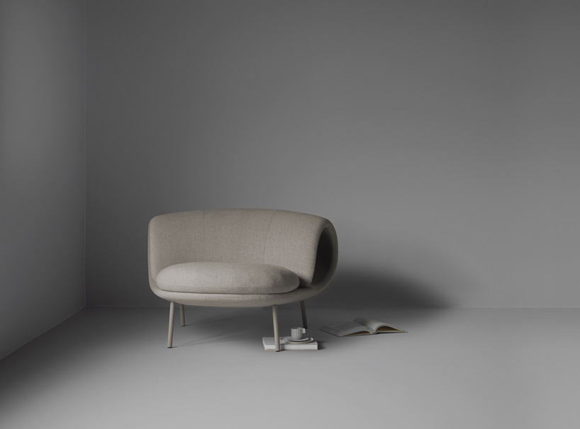 jin kuramoto's 'maki' chair for OFFECCT features a curved hollow backrest
