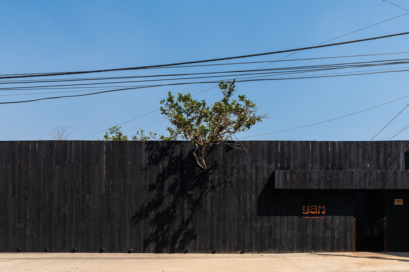  sawadeesign connects the functions of YAM restaurant in vietnam with burnt orange bridge