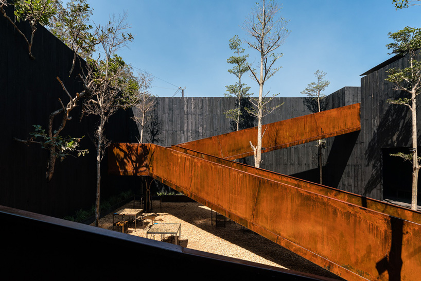  sawadeesign connects the functions of YAM restaurant in vietnam with burnt orange bridge