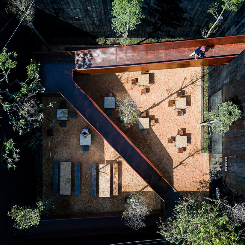  sawadeesign connects the functions of YAM restaurant in vietnam with burnt orange bridge