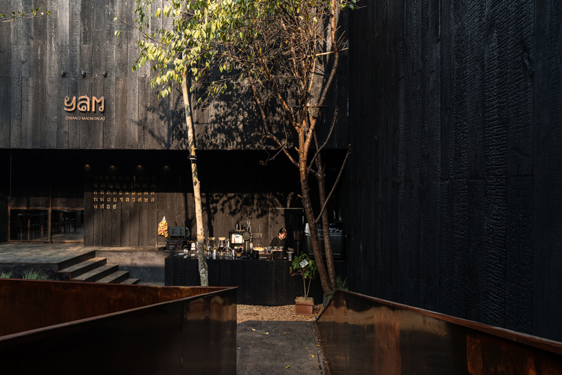 sawadeesign connects the functions of YAM restaurant in vietnam with burnt orange bridge