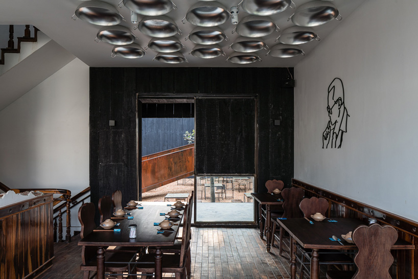  sawadeesign connects the functions of YAM restaurant in vietnam with burnt orange bridge