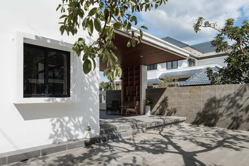 story architecture completes cubic white-hued house for young family in vietnam