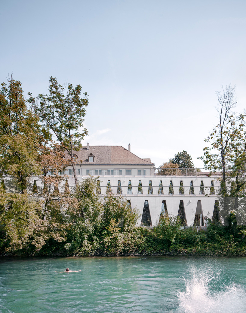 barozzi veiga clads tanzhaus zürich in façade of repetitive triangular openings