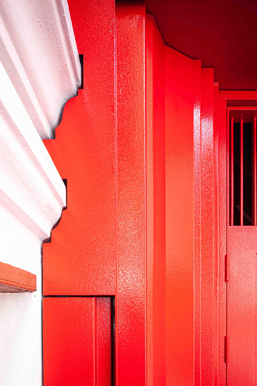 walllasia builds a tiny red museum into bangkok's royal monastery designboom