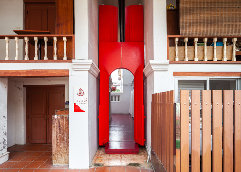 walllasia builds a tiny red museum into bangkok's royal monastery designboom