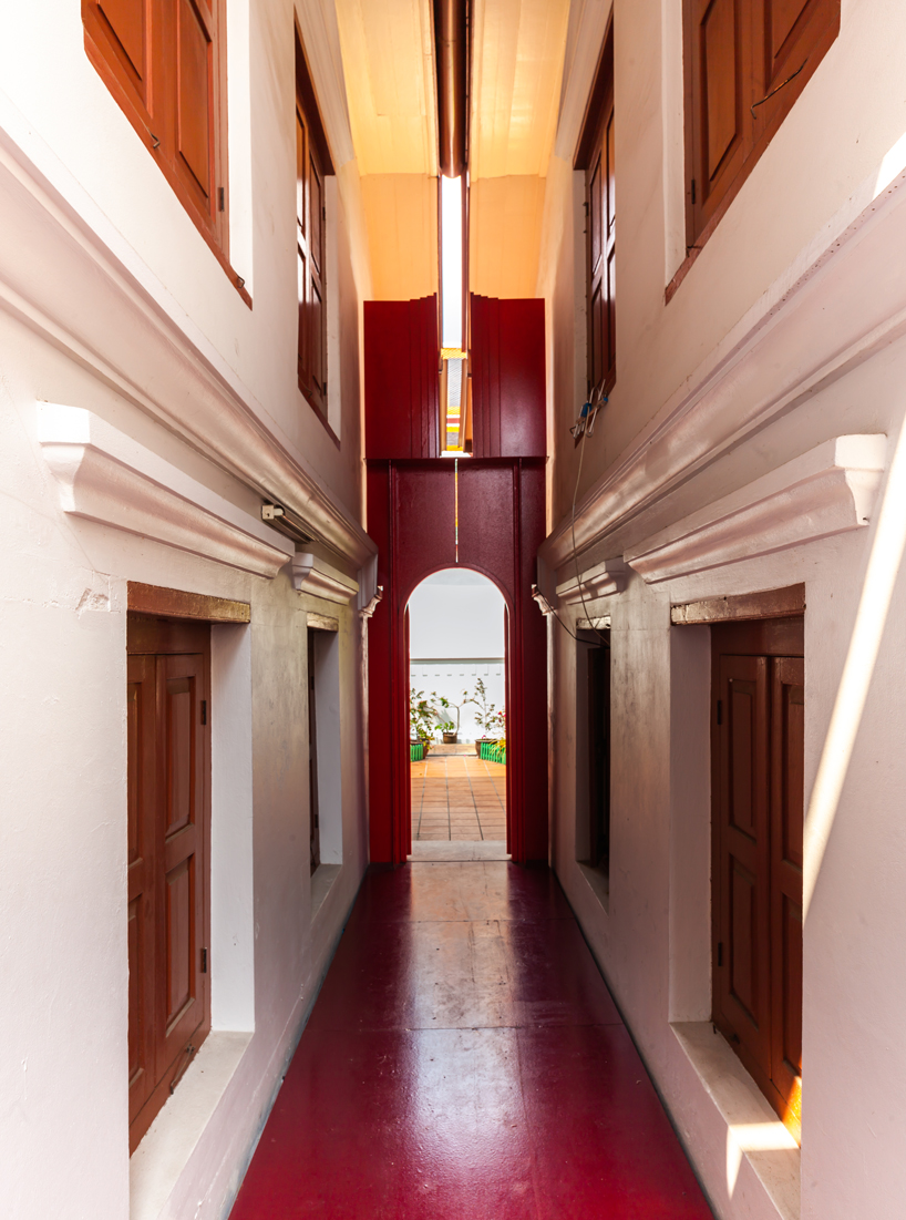 walllasia builds a tiny red museum into bangkok's royal monastery designboom