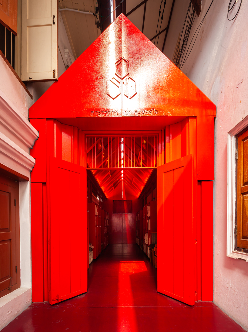 walllasia builds a tiny red museum into bangkok's royal monastery designboom