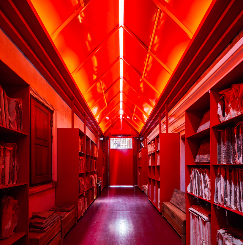 walllasia builds a tiny red museum into bangkok's royal monastery designboom