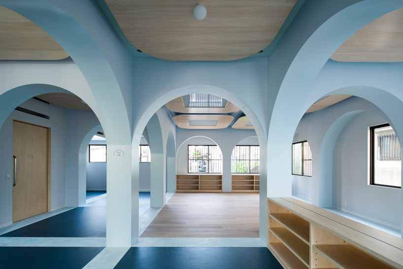 atelier satoshi takijiri creates arched interior for 'joyo parc' children's space in japan