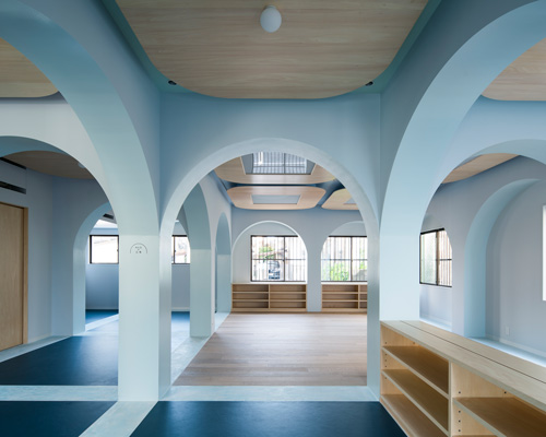 atelier satoshi takijiri creates arched interior for 'joyo parc' children's space in japan