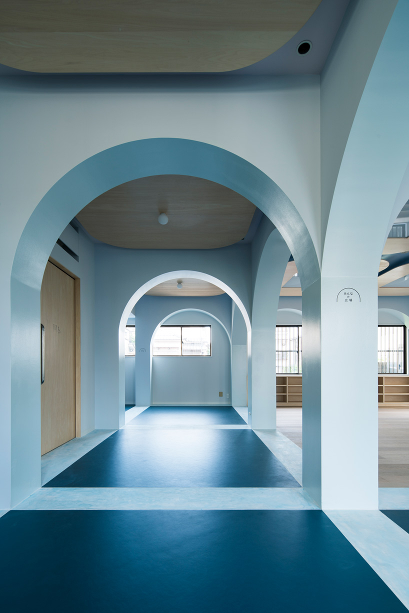 atelier satoshi takijiri creates arched interior for 'joyo parc' children's space in japan