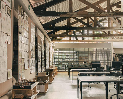 esrawe studio refurbishes 1950s warehouse into its own spacious atelier in mexico city