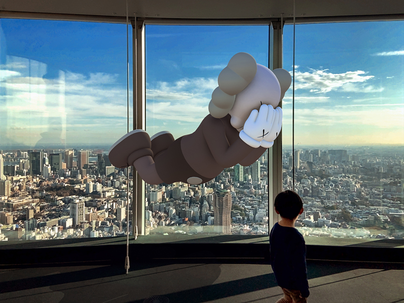 KAWS & acute art launch monumental AR sculptures in 12 locations around the world