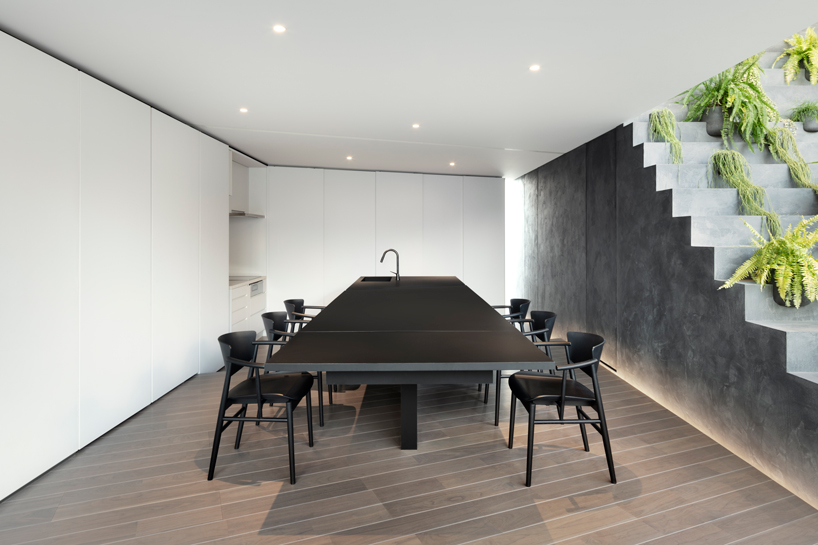 nendo's stairway house leads into a light, plant-filled interior in tokyo - 2