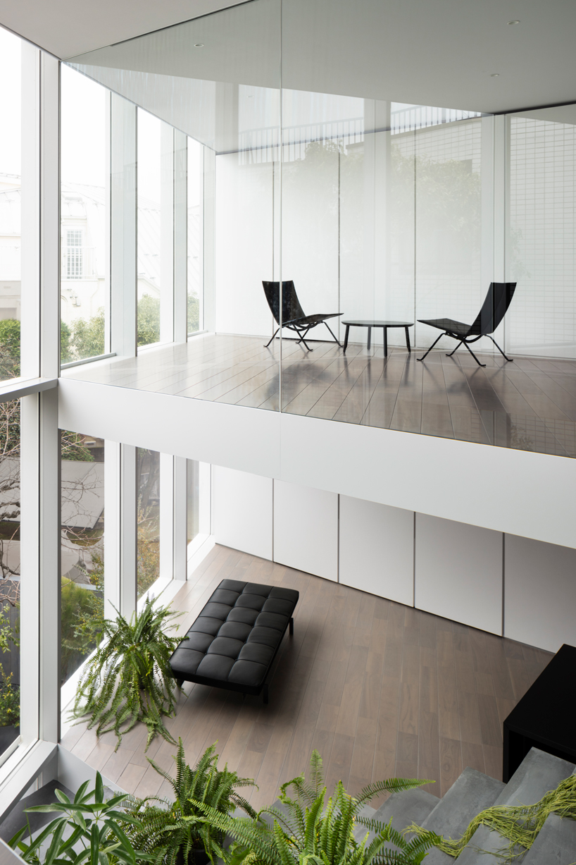 nendo's stairway house leads into a light, plant-filled interior in tokyo - 3