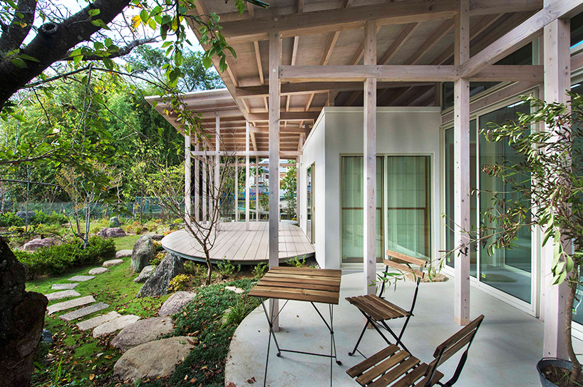 studio velocity hides japanese house on the hedge behind tall hedges