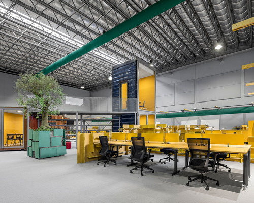 studium occupies vast, underground warehouse in porto with 'spectris' creative workspace