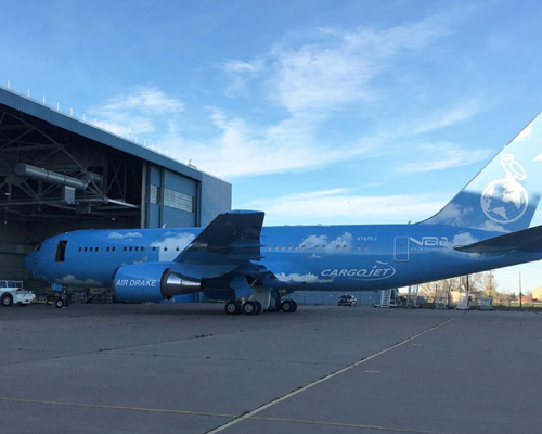 virgil abloh customizes drake's boeing private jet with white clouds