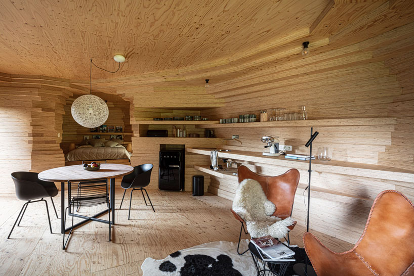 corten steel wraps a sculptural guesthouse designed by atelier vens vanbelle in belgium designboom