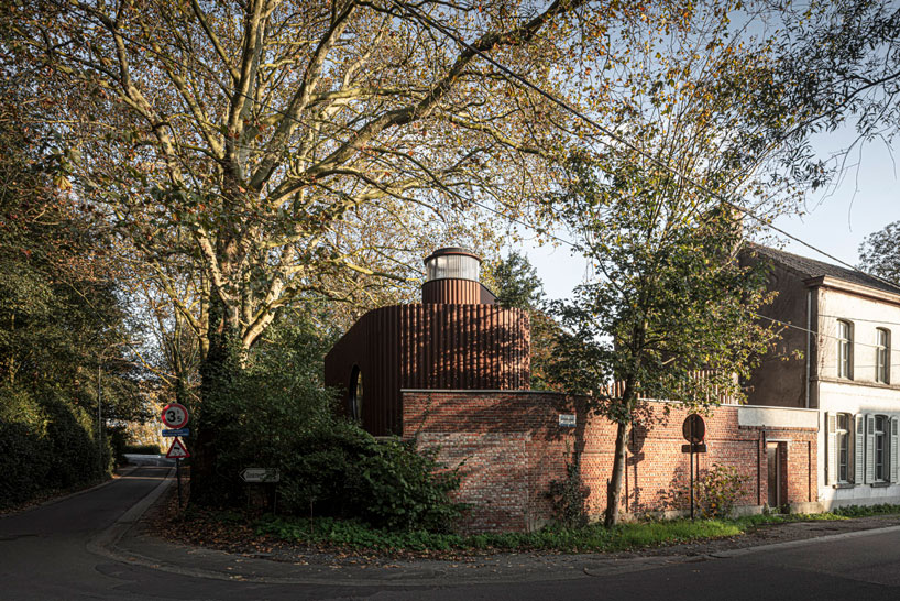 corten steel wraps a sculptural guesthouse designed by atelier vens vanbelle in belgium designboom