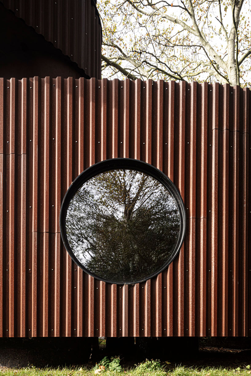 corten steel wraps a sculptural guesthouse designed by atelier vens vanbelle in belgium designboom