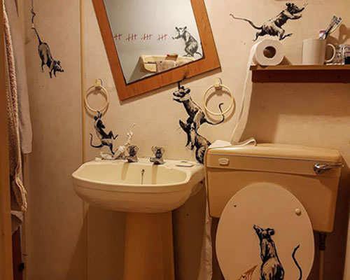 banksy creates lockdown artwork sharing bathroom makeover