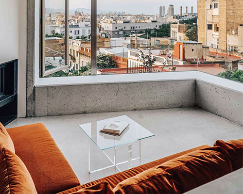 barbara appolloni converts a garage into a stylish 'shoebox' apartment in barcelona