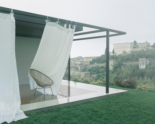 a former warehouse in italy becomes a home by deltastudio entitled 'elena'