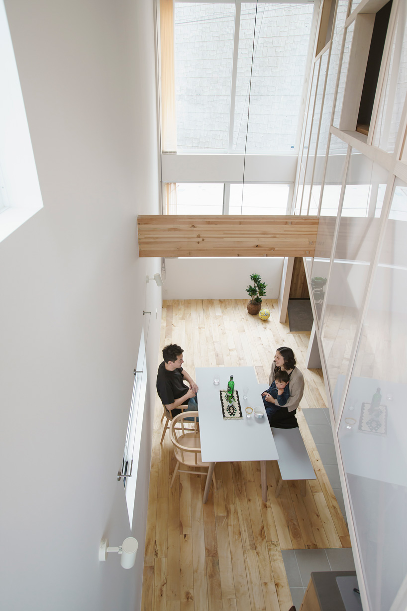eri sumitomo architects + enjoyworks insert acrylic 'curtain' within house in hayama, japan - 2
