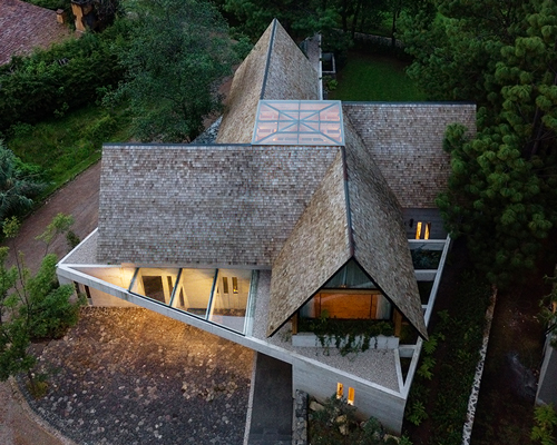 estudio MMX organizes CRA house in mexico as a rotated cross
