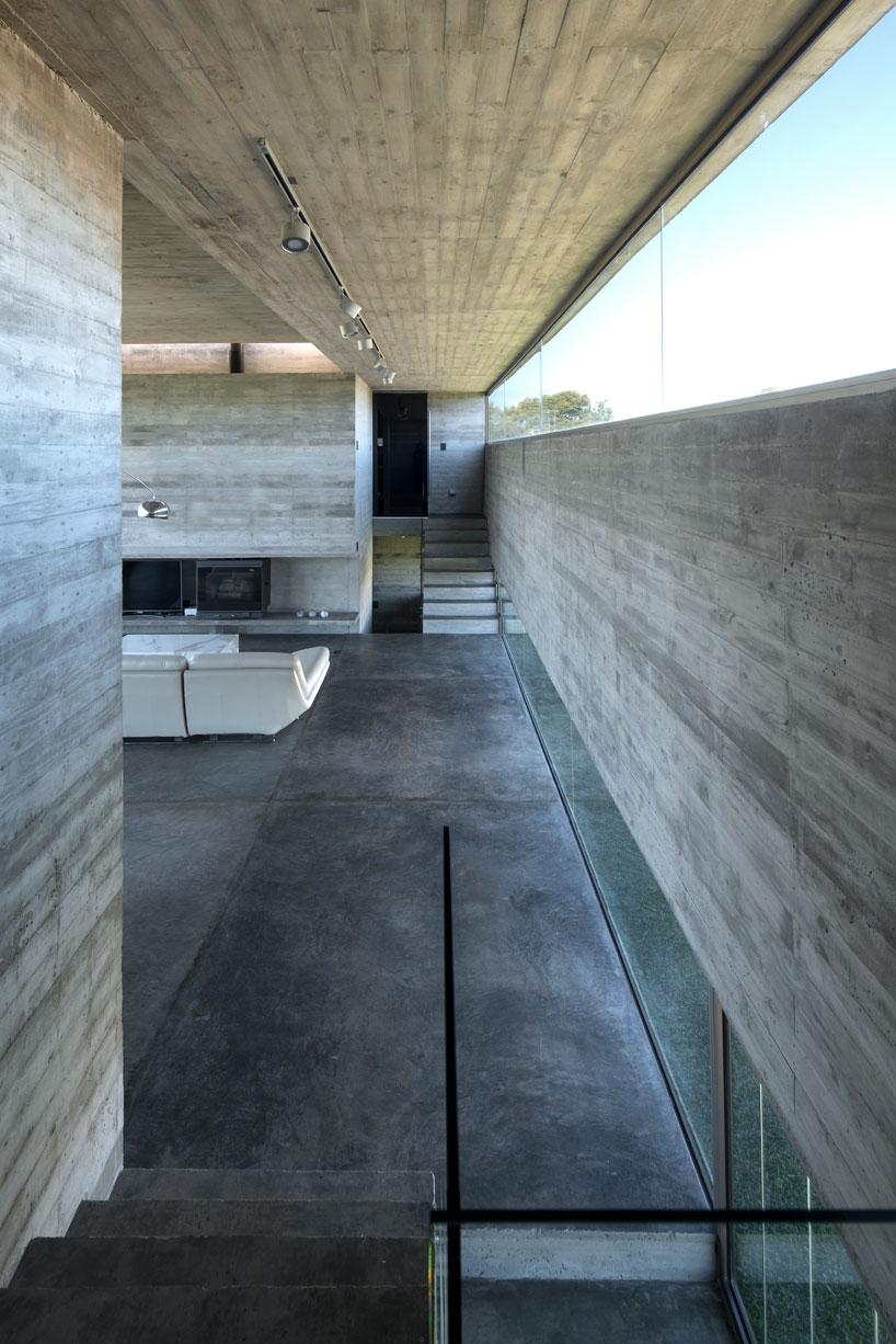 horizontal concrete planes articulate the escobar house by luciano kruk in argentina designboom