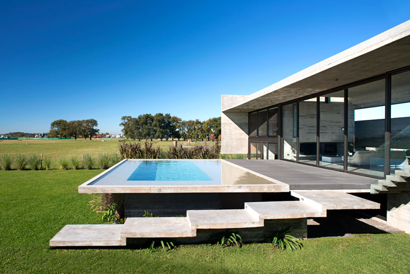 horizontal concrete planes articulate the escobar house by luciano kruk in argentina designboom