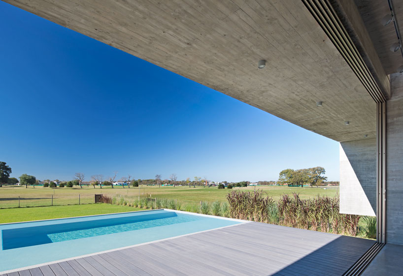 horizontal concrete planes articulate the escobar house by luciano kruk in argentina designboom