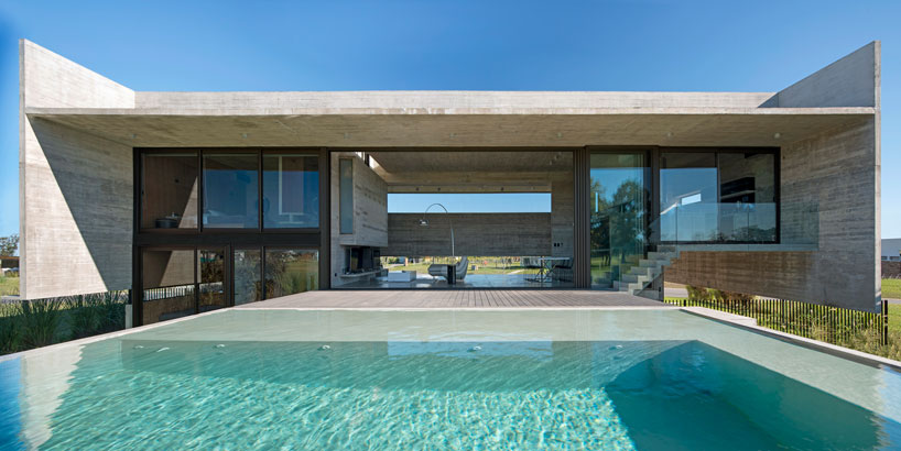 horizontal concrete planes articulate the escobar house by luciano kruk in argentina designboom