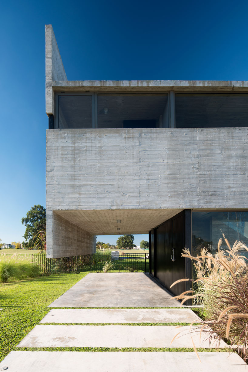horizontal concrete planes articulate the escobar house by luciano kruk in argentina designboom