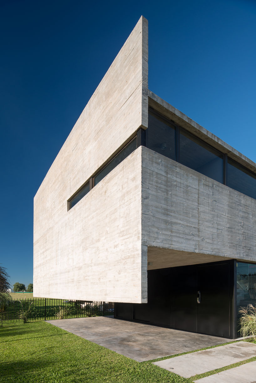 horizontal concrete planes articulate the escobar house by luciano kruk in argentina designboom