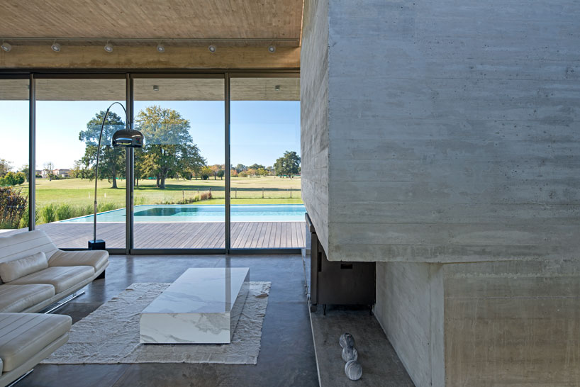 horizontal concrete planes articulate the escobar house by luciano kruk in argentina designboom