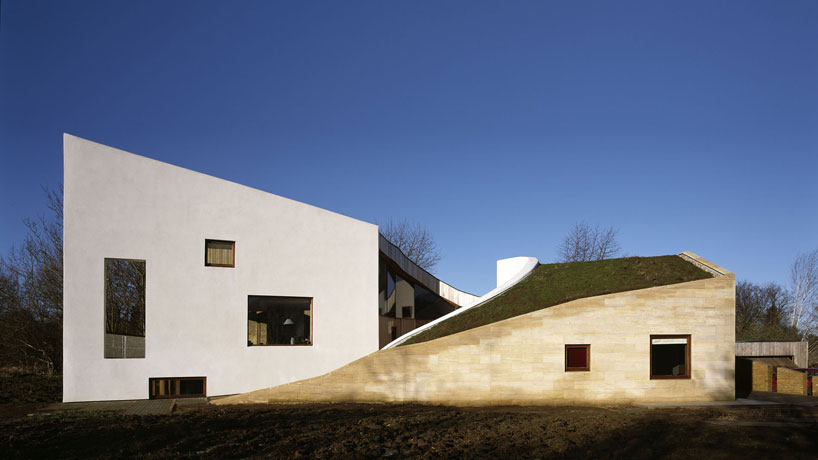 featherstone young builds a house with folding green roofs in rural england designboom