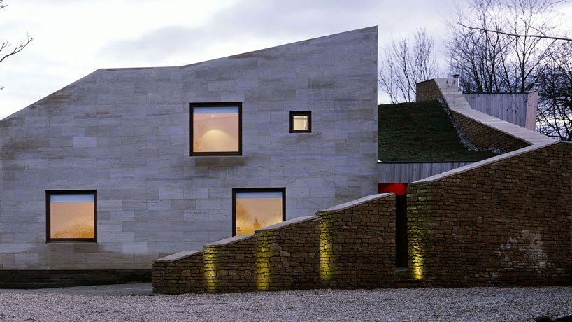 featherstone young builds a house with folding green roofs in rural england designboom