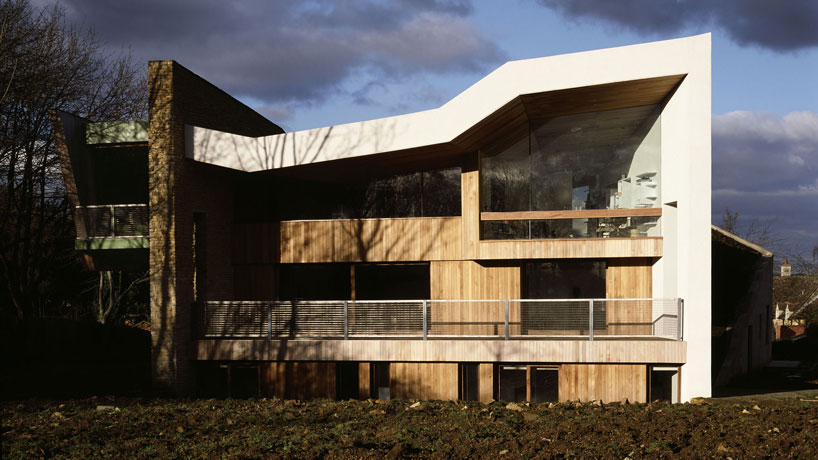 featherstone young builds a house with folding green roofs in rural england designboom