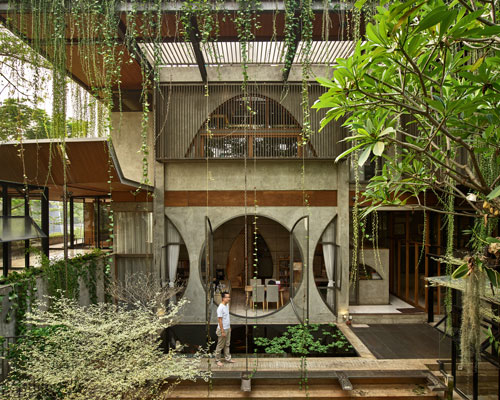 lush greenery envelops RAW architecture's multi-purpose complex in indonesia