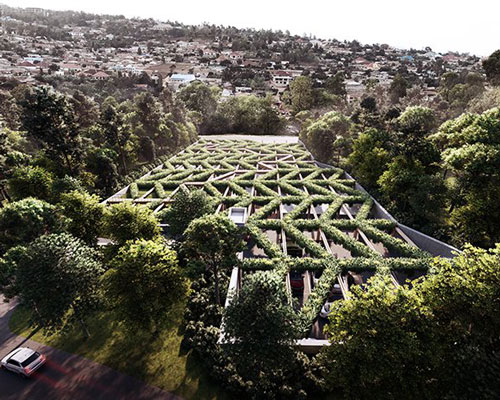 HOPE dental center in rwanda rethinks healthcare with a sunken space hugged by the land
