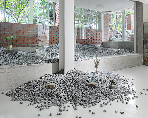 jeonghwa seo echoes the landscape of a rock quarry in seoul with bloom & co.