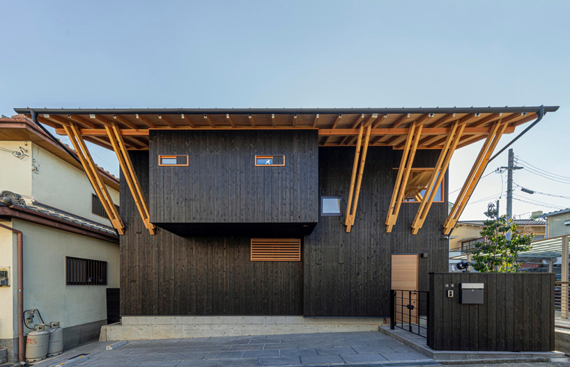 masaru takahashi clads family house 'G' in charred wood exterior in japan