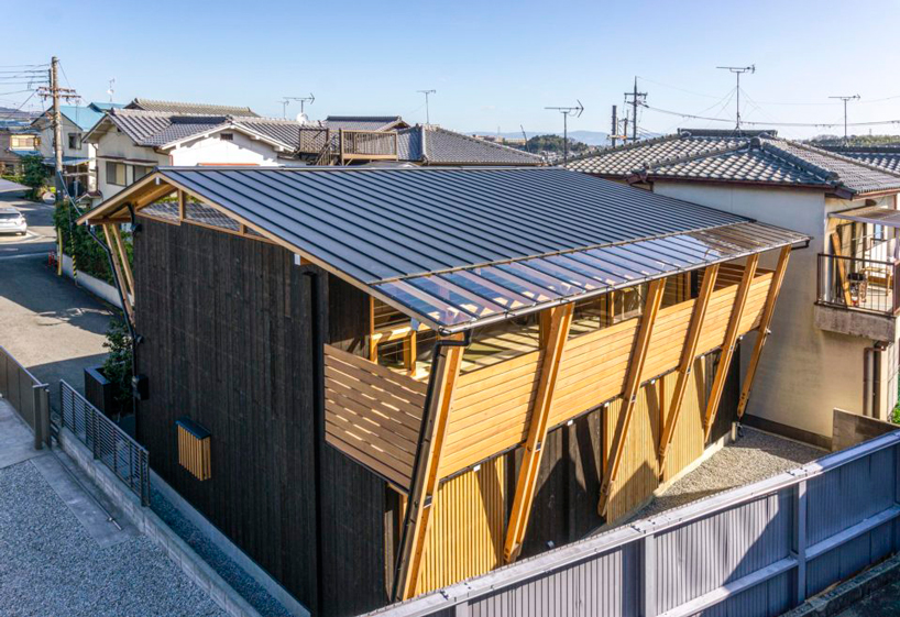 masaru takahashi clads family house 'G' in charred wood exterior in japan