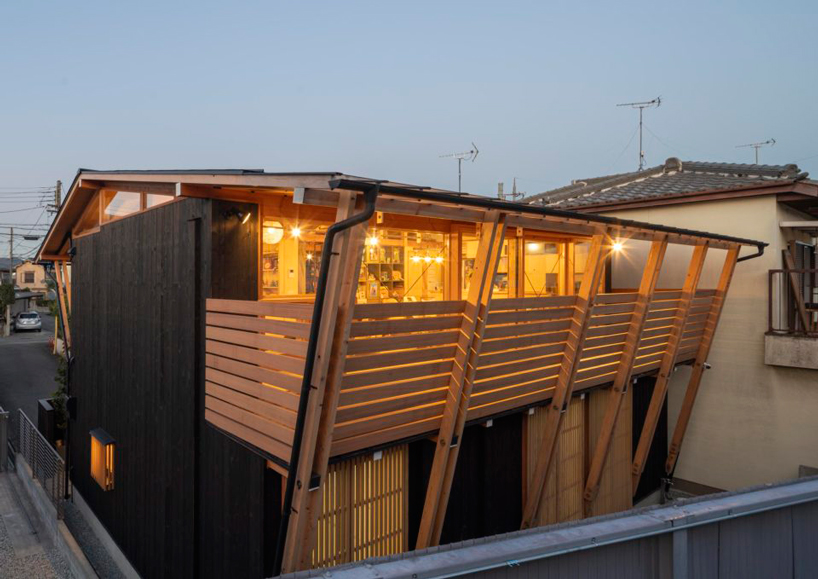 masaru takahashi clads family house 'G' in charred wood exterior in japan - 8
